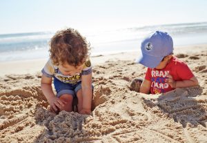 children playing in the sand