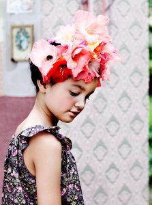 girl with flowers on her head