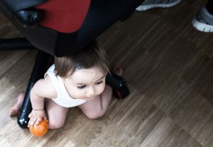 baby playing on the floor